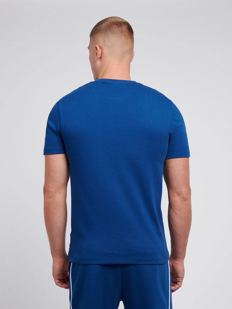 U.S. Polo Assn. blue cotton t-shirt featuring white vertical piping and an embroidered logo.