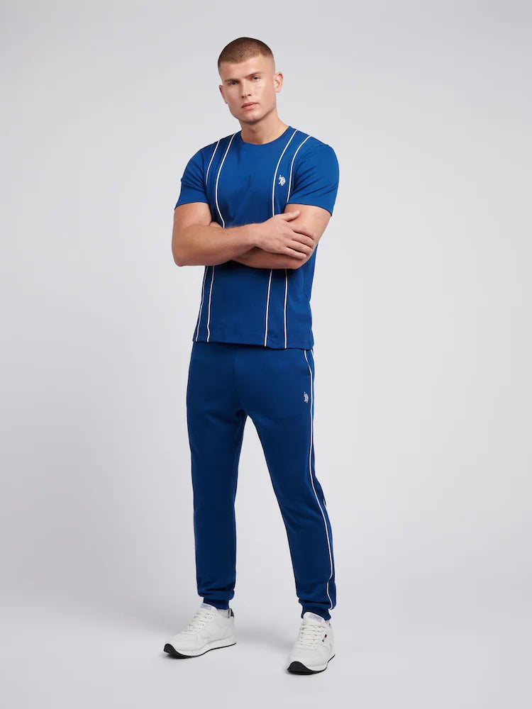 U.S. Polo Assn. blue cotton t-shirt featuring white vertical piping and an embroidered logo.