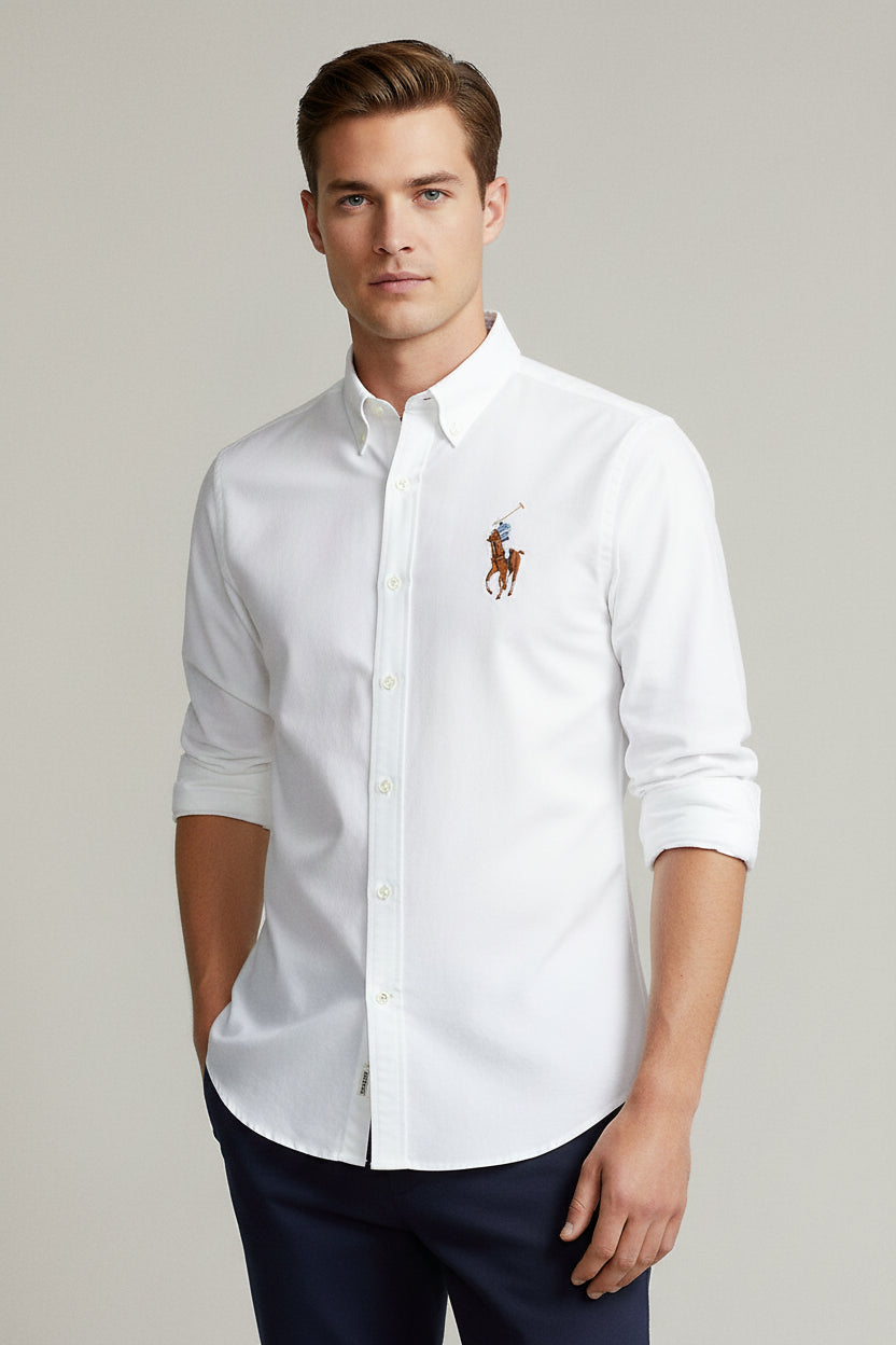 White button-up shirt with a logo on a light gray background