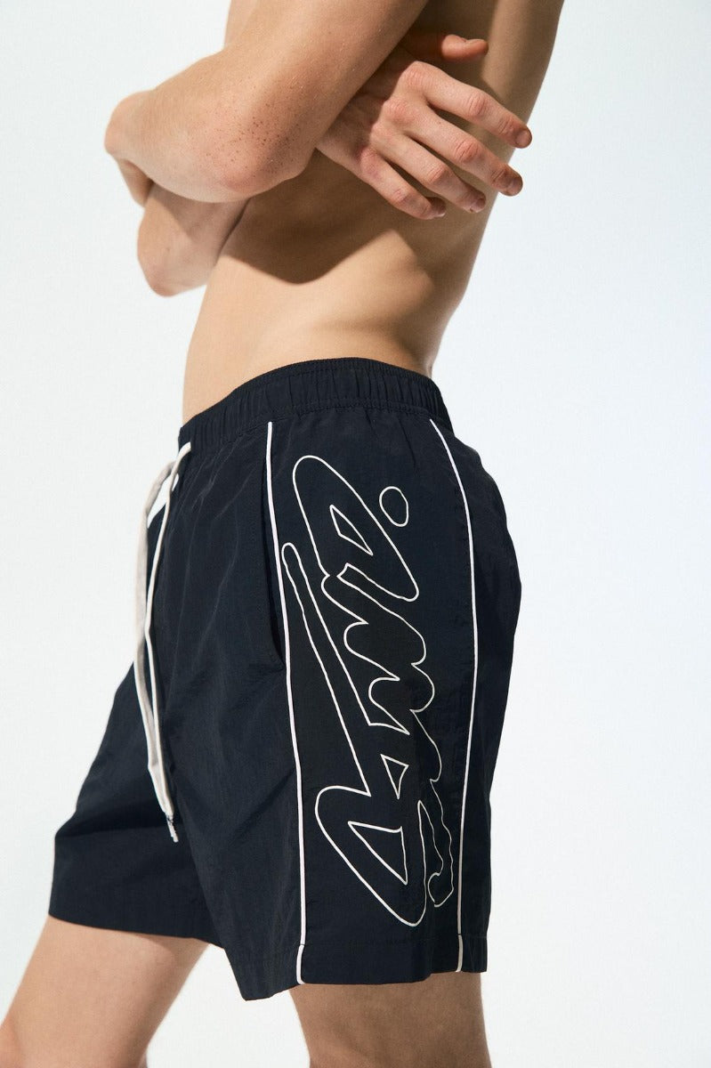 STWD side stripe swim shorts